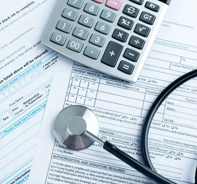 A calculator and a stethoscope rest on top of medical forms, which display sections for patient information and authorizations. The scene conveys a sense of financial and medical considerations.